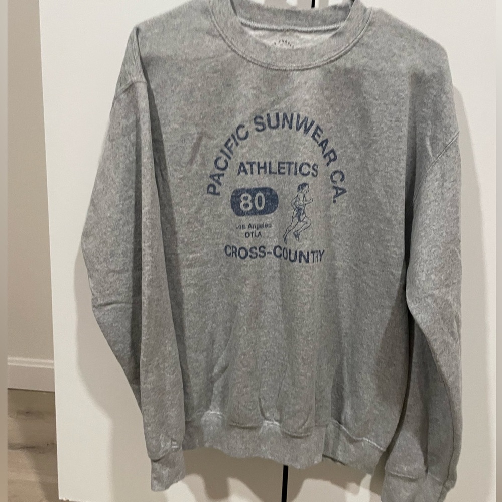 Grey graphic crewneck with blue writing